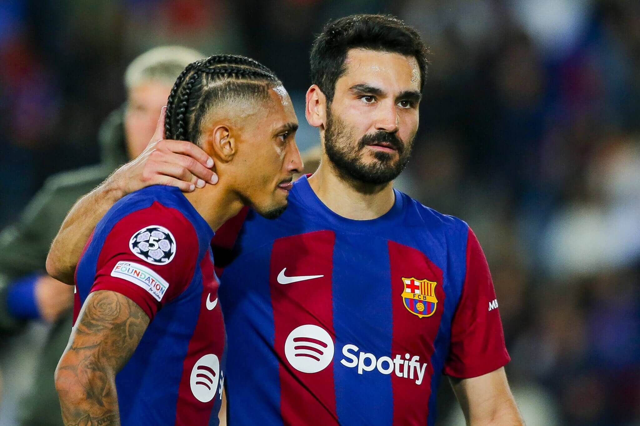 Ilkay Gundogan consoles Raphinha after the final whistle (Adria Puig/Anadolu via Getty Images)