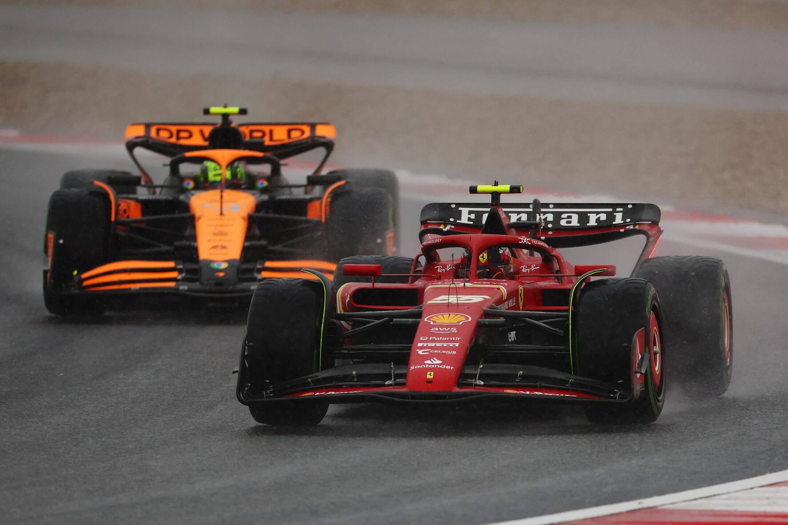 HANGHAI, CHINA - APRIL 19: Carlos Sainz of Spain driving (55) the Ferrari SF-24 leads Lando Norris of Great Britain driving the (4) McLaren MCL38 Mercedes on track during Sprint Qualifying ahead of the F1 Grand Prix of China at Shanghai International Circuit on April 19, 2024 in Shanghai, China. (Photo by Lintao Zhang/Getty Images )