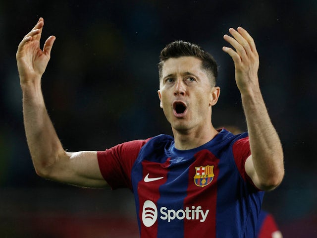 Barcelona's Robert Lewandowski celebrates scoring their third goal on April 29, 2024