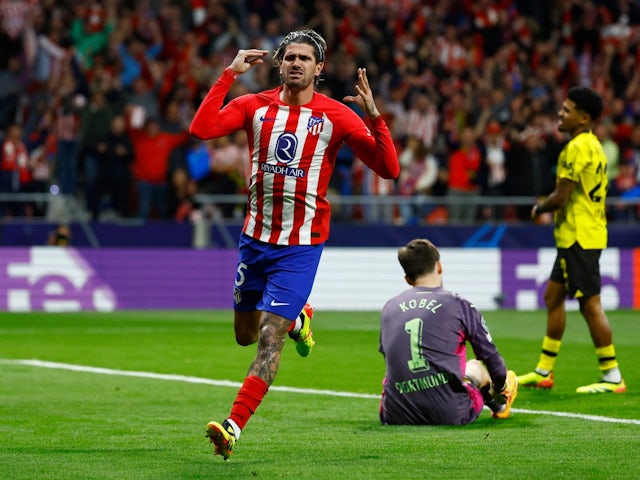 Atletico Madrid's Rodrigo De Paul celebrates scoring their first goal on April 10, 2024
