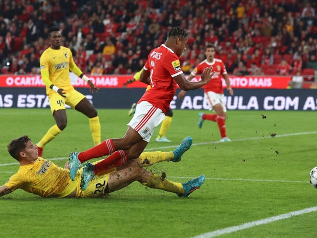 Benfica's David Neres in action with Portimonense's Filipe Relvas on January 6, 2023