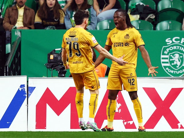 Boavista's Gaius Makouta celebrates scoring their first goal with Pedro Malheiro on March 17, 2024
