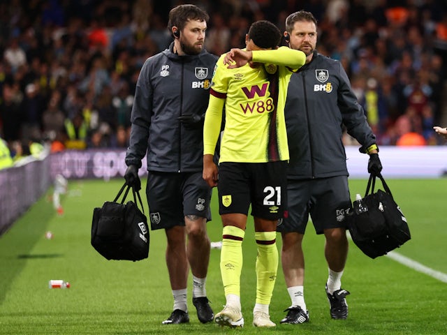 Burnley's Aaron Ramsey walks off the pitch after receiving medical attention on August 30, 2023