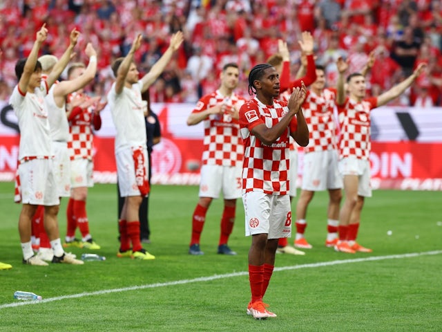 Mainz 05's Leandro Barreiro and teammates celebrate after the match on May 11, 2024