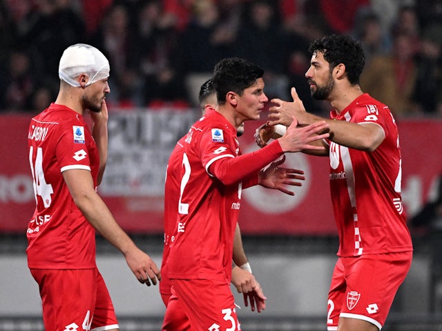 Monza's Matteo Pessina celebrates scoring their first goal with Pablo Mari on February 18, 2024