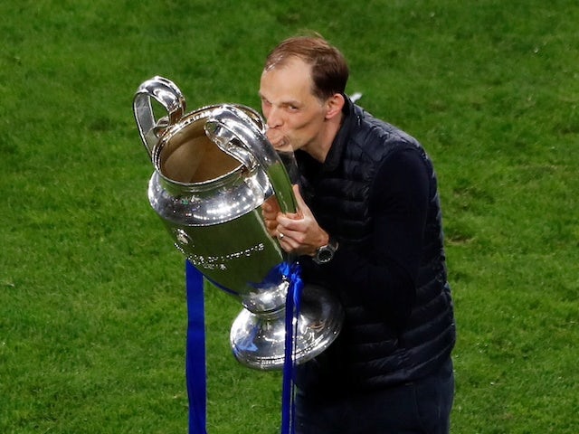 Chelsea manager Thomas Tuchel celebrates with the Champions League trophy on May 29, 2021