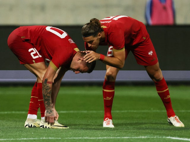 Serbia's Sergej Milinkovic-Savic celebrates scoring their first goal with Srdjan Babic on March 25, 2024