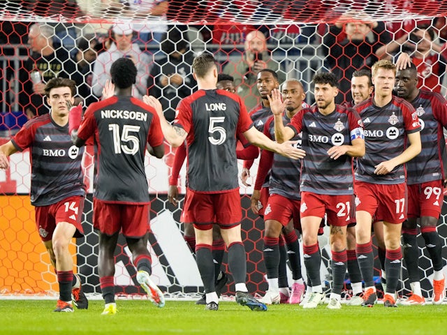 Toronto forward Federico Bernardeschi celebrates scoring a goal with his teammates