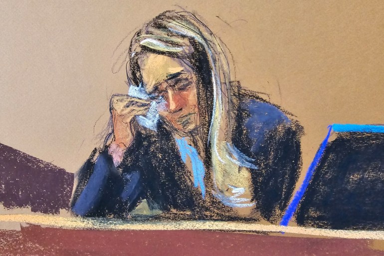 A courtroom sketch of Hope Hicks dabbing her eyes with a tissue.