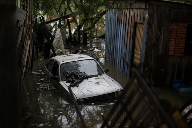 View of a flooded house at the Sarandi neighborhood in Porto Alegre, Rio Grande do Sul state, Brazil on May 3, 2024. - Brazilian President Luiz Inacio Lula da Silva on Thursday visited the country's south where floods and mudslides caused by torrential rains have killed 29 people, with the toll expected to rise. (Photo by Anselmo Cunha / AFP)