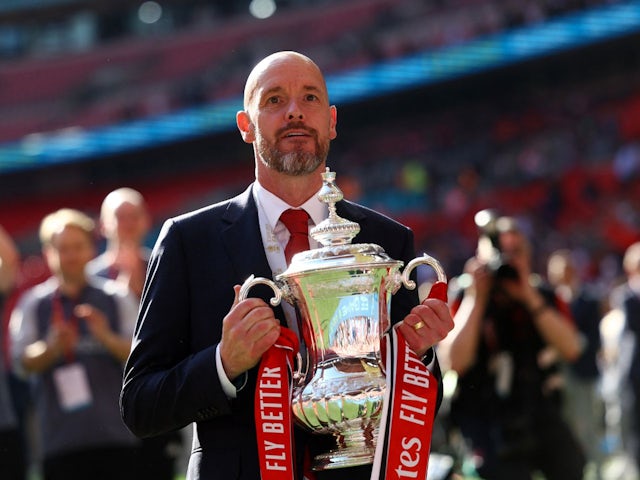 Manchester United manager Erik ten Hag celebrates with the trophy after winning the FA Cup on May 25, 2024