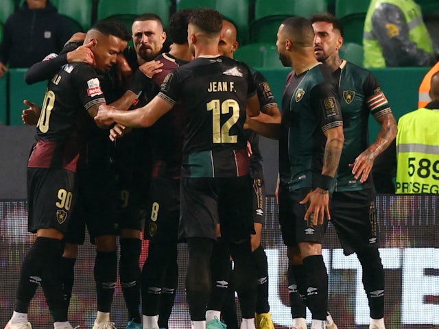 Estrela da Amadora's Leo Jaba celebrates scoring their first goal with teammates on November 5, 2023