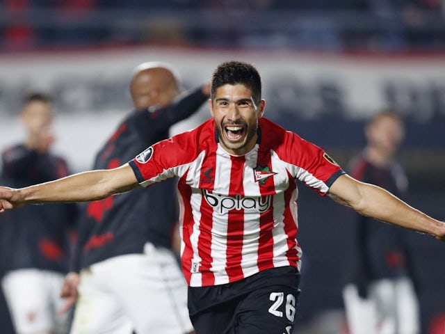 Luciano Lollo celebrates scoring for Estudiantes on August 11, 2022