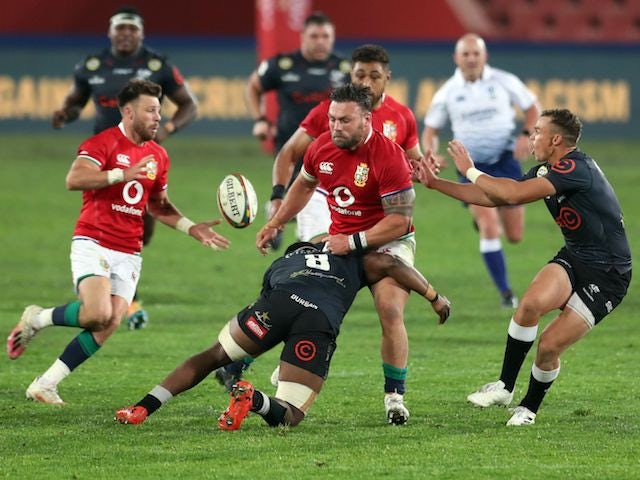 British and Irish Lions' Rory Sutherland in action with Sharks' Phendulani Buthelezi on July 7, 2021