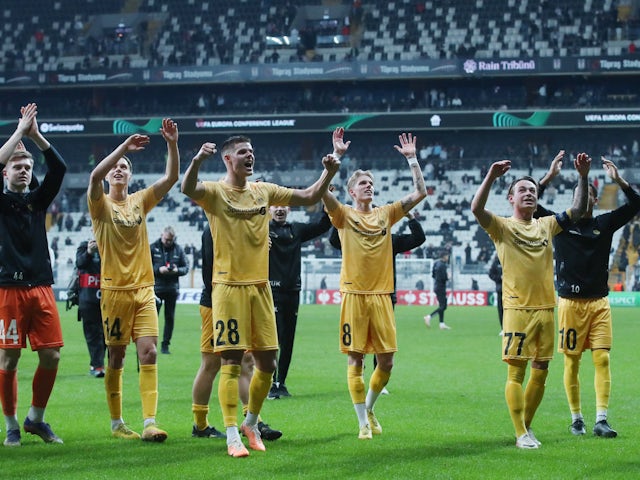 Bodo/Glimt's Patrick Berg, Oscar Kapskarmo and Magnus Brondbo celebrate with teammates after the match on November 9, 2023