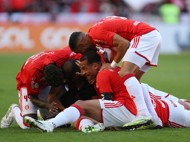 Internacional's Fabricio Bustos celebrates scoring their first goal with teammates on July 29, 2023