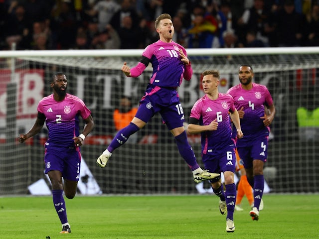 Germany's Maximilian Mittelstadt celebrates scoring their first goal with teammates on March 26, 2024
