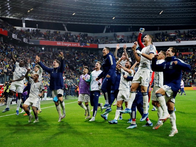 Italy players celebrate qualifying for Euro 2024 on November 20, 2023