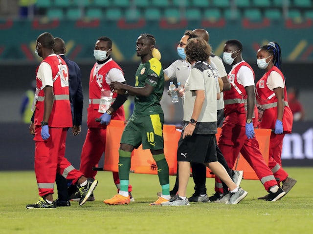 Senegal's Sadio Mane receives medical attention after sustaining an injury on January 25, 2022