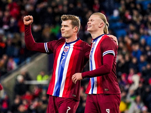 Norway's Alexander Sorloth celebrates scoring their first goal with Erling Haaland on March 26, 2024