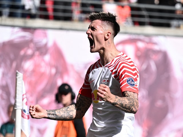 Benjamin Sesko celebrates scoring for RB Leipzig in April 2024