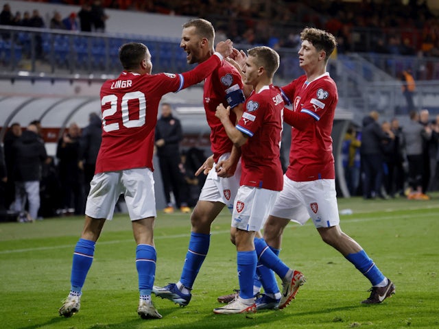 Czech Republic's Tomas Soucek celebrates scoring their first goal with teammates on October 15, 2023