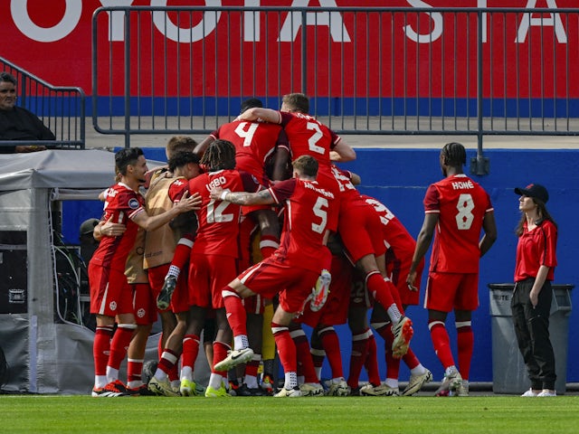 Canada celebrates a goal scored by Canada forward Jacob Shaffelburg on March 23, 2024
