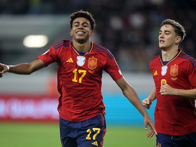 Spain's Lamine Yamal celebrates scoring their first goal with Gavi on November 16, 2023