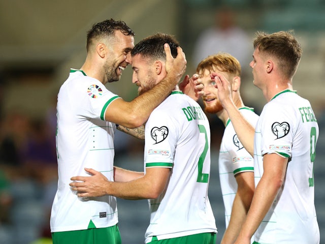 Republic of Ireland's Matt Doherty celebrates scoring their third goal with Shane Duffy on October 16, 2023