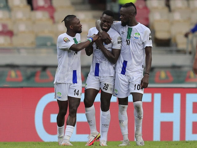 Sierra Leone's Musa Noah Kamara looks dejected as Kei Ansu Kamara and Mohamed Buya Turay look on on January 16, 2022