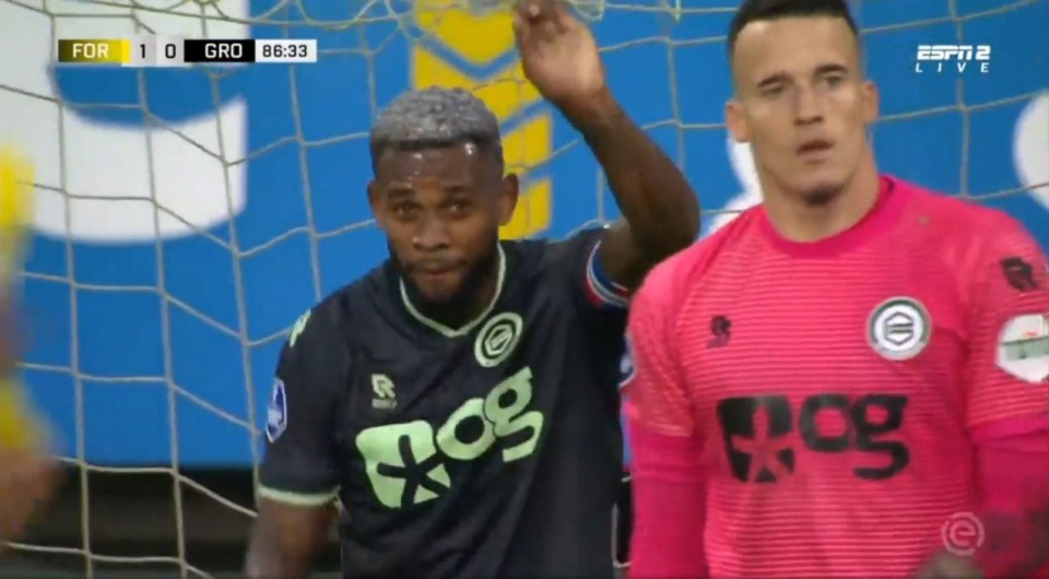 The ex-Premier League star held onto the the roof of the net looking devastated