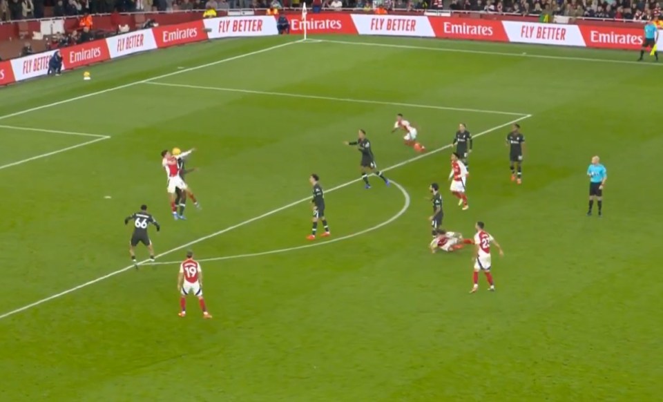 The striker raised his arms in the challenge