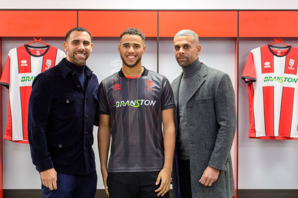 Anton Ferdinand and his cousin Max look after the Lincoln star