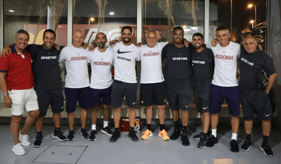 Candido poses next to Jose Mourinho with the Sporting coaching staff
