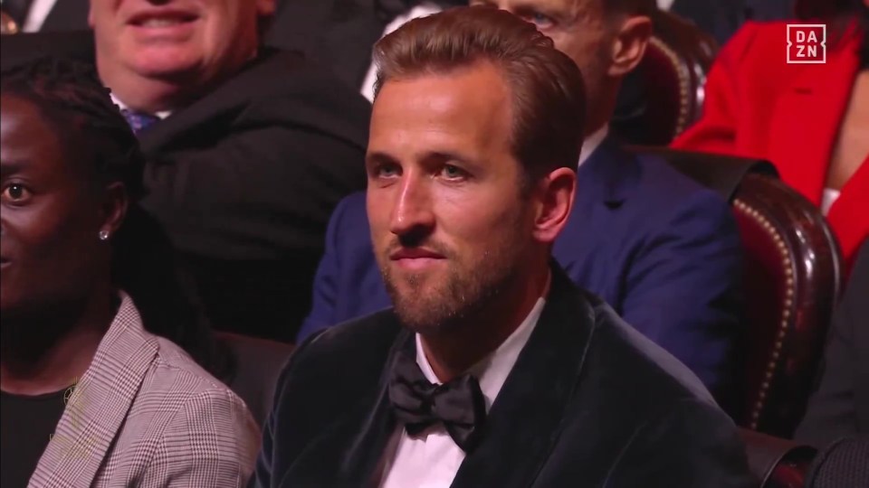 Harry Kane smiled on as he heard Weah's gushing assessment of him