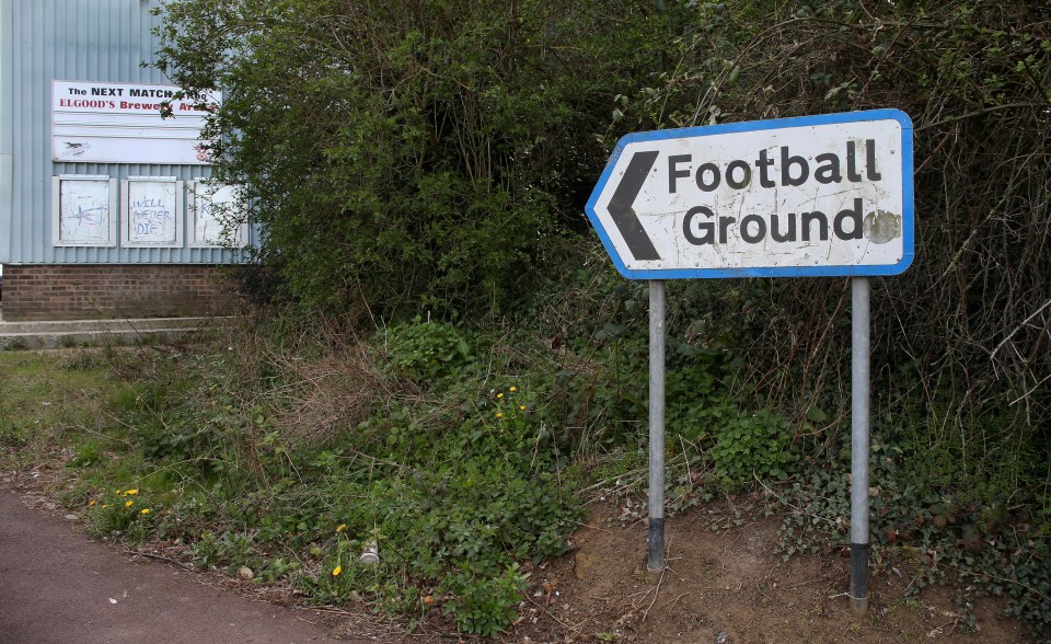 Signs pointed to the ground that was no longer in use
