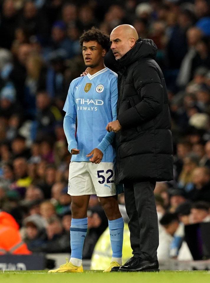 Oscar Bobb with manager Pep Guardiola