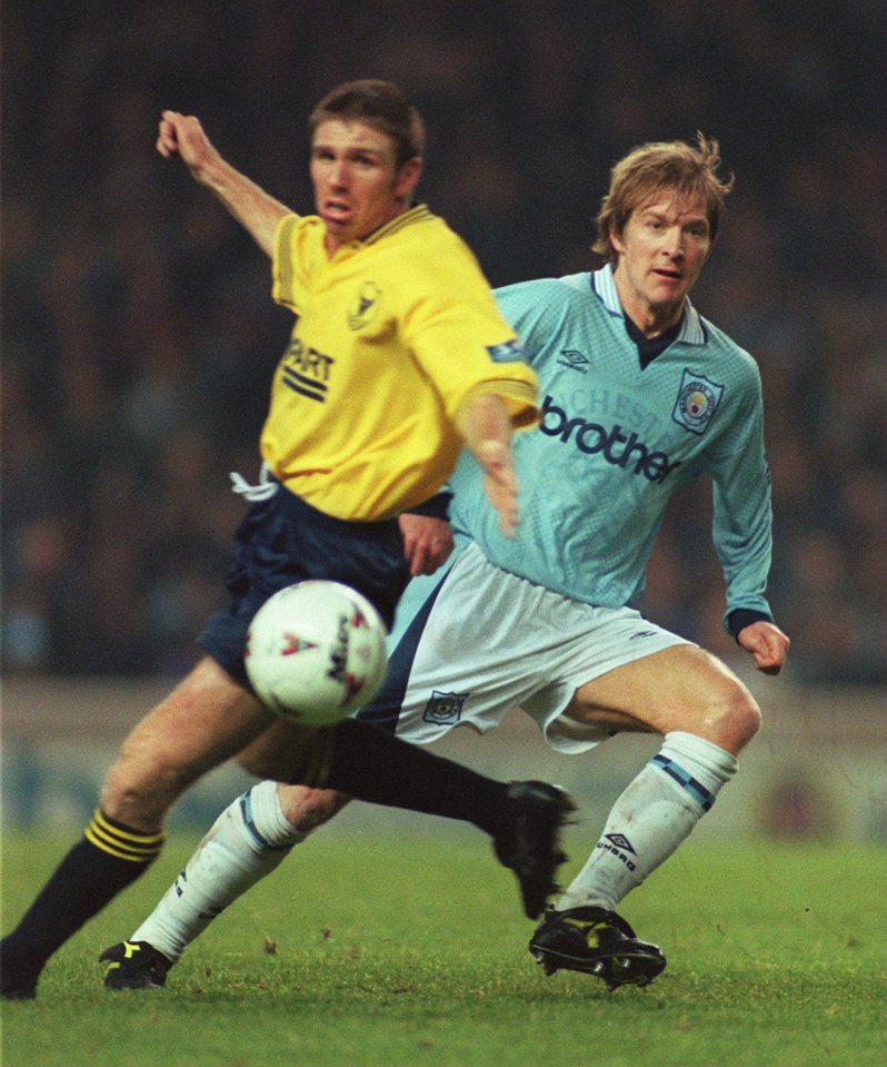 Martin Gray pictured in action for Oxford United against Man City