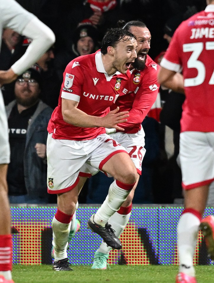 Oliver Rathbone celebrates his late Wrexham winner