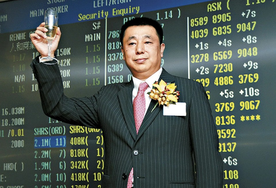 Dai Yongge, Chairman of Renhe Commercial Holdings Co Ltd, toasting.