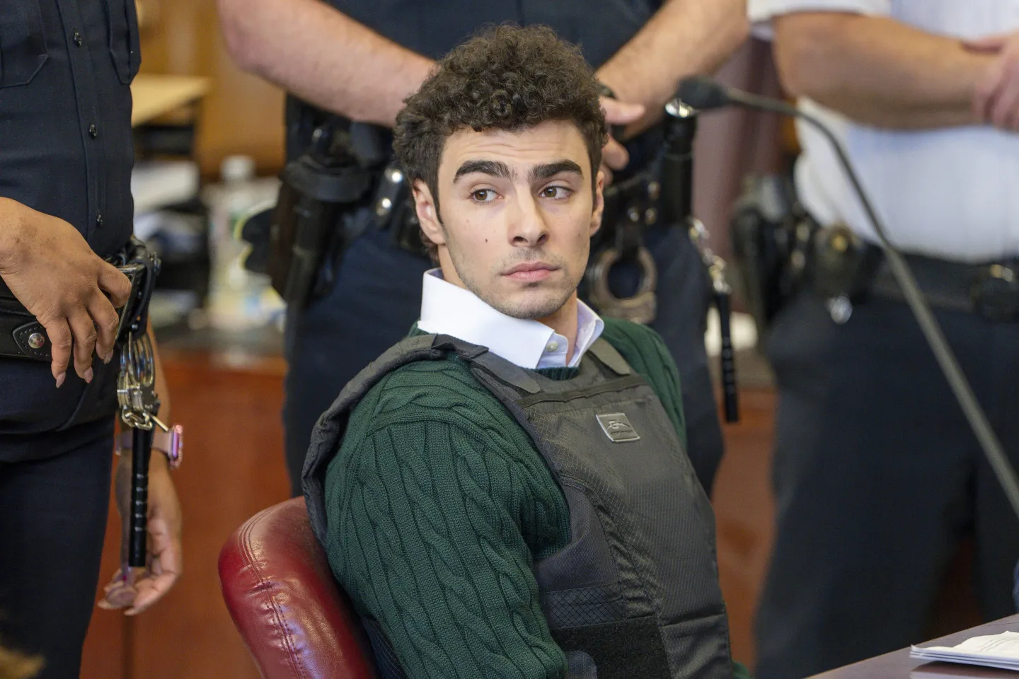 Luigi Mangione, accused of fatally shooting the UnitedHealthcare CEO Brian Thompson in New York City and leading authorities on a five-day search is scheduled, appears in court for a hearing, Feb. 21, 2025, in New York. 