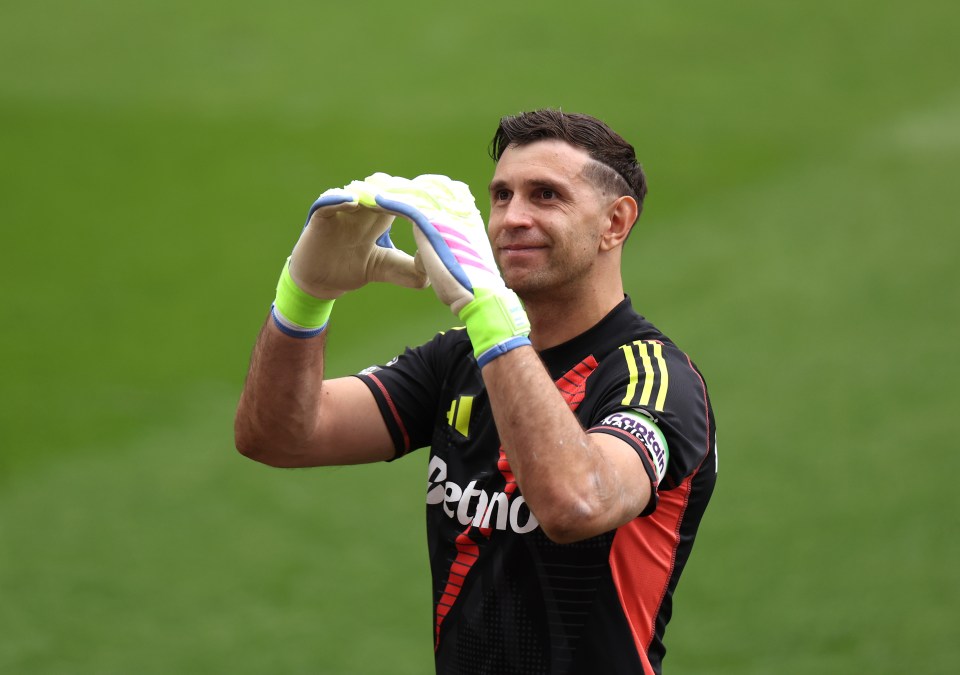 Emiliano Martinez of Aston Villa acknowledges fans after a soccer match.