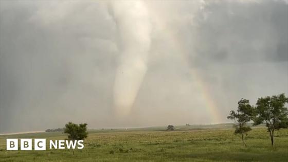 ‘Spectacular’ moment an enormous tornado crosses a rainbow