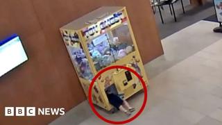 Watch: Moment child gets stuck inside a claw machine