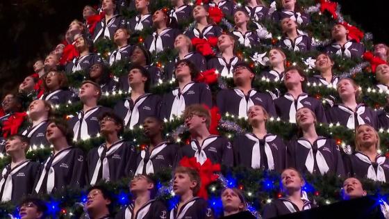 Video. A choir inside a giant Christmas tree in the USA