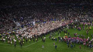 Thousands of PSG fans invade pitch and tear down goals after stunning Champions League final win over Inter Milan