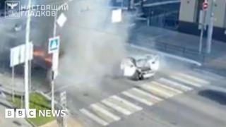 Passengers escape car hit by drone in Russia