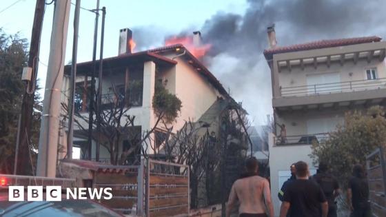 Firefighters battle to contain wildfires across Greece