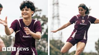 Why did only two Iranian football players stay in Australia?