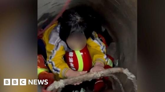 Moment firefighters rescue girl trapped in drain for seven hours